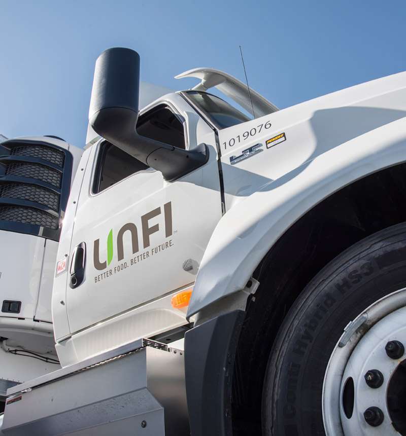 White truck with United Natural Food Logo