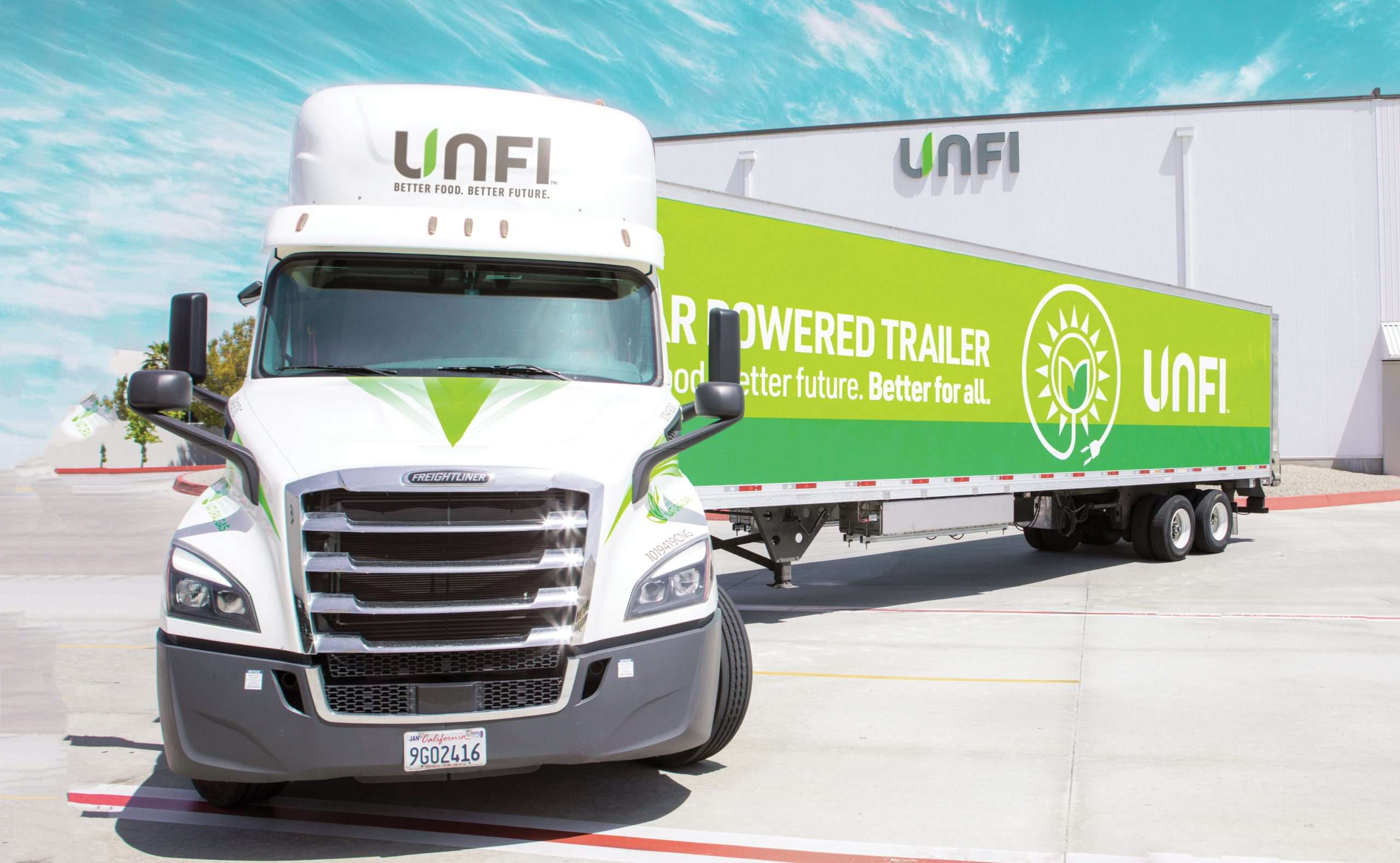 white truck with green trailer